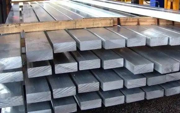 Neatly stacked high-quality square steel bars ready for shipment