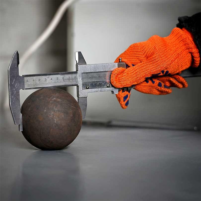  Camasteel technician testing hardness of forged steel grinding media balls
