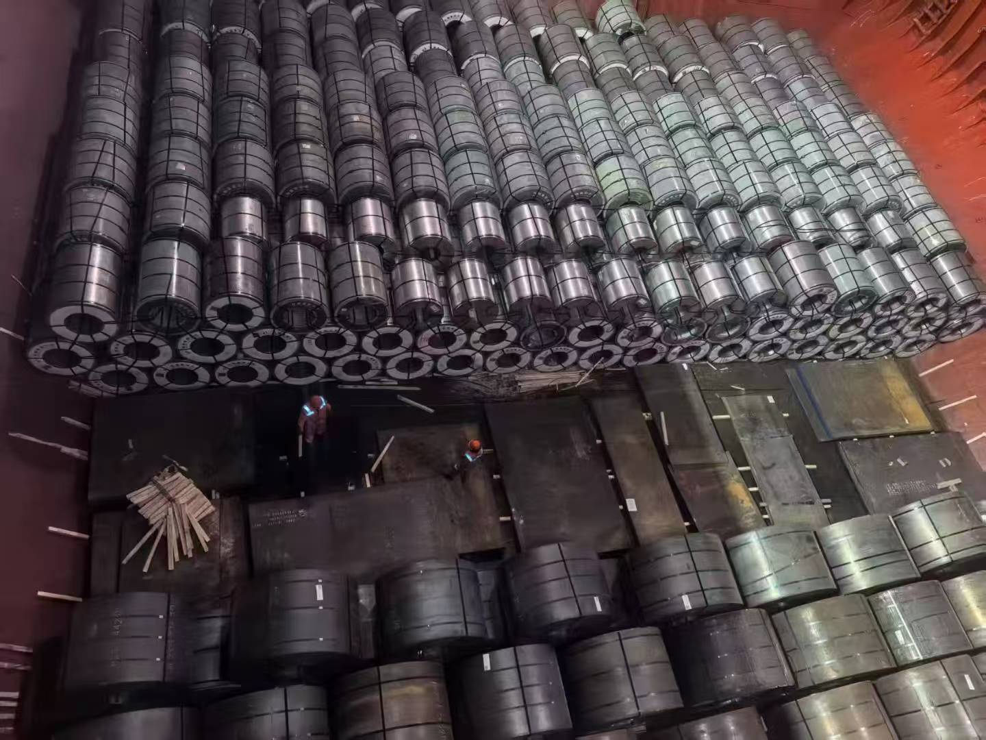 Massive stockpile of steel coils and plates stored in a Chinese steel warehouse
