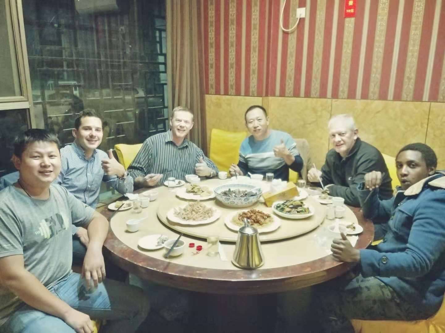 Camasteel team and international clients enjoying business dinner together