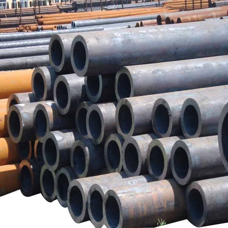 Stacked heavy seamless steel pipes ready for industrial projects